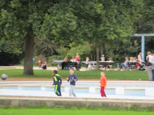 Kids playing in the playground area of Vondelpark.