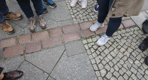 Bricks demarking an area where the wall was.