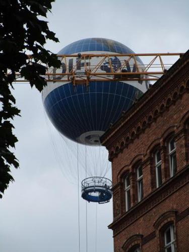 What appears to be a tethered balloon ride.